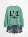 Detail of ribbed crew neck and LAKE life print on mint green casual long sleeve sweatshirt - Light Green Sweatshirt (Black Print)