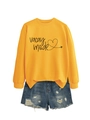 Close-up of Vacay Mode print and heart detail on long-sleeve yellow sweatshirt - Yellow (Black Letters)