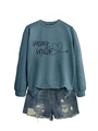 Detail of Vacay Mode blue sweatshirt with heart print and distressed denim shorts - Blue (Black Print)