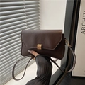 Chic brown rectangular baguette bag with a gold buckle and slim shoulder strap - Brown
