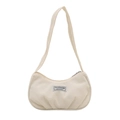 Minimalist beige corduroy hobo bag with a fashion instinct label on a white background - White