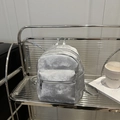 Silver metallic mini PU leather backpack with brand logo on modern glass shelf - Silver with Charm