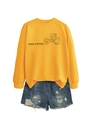 Detail of yellow crewneck sweatshirt featuring a tractor graphic and thank a farmer text - Yellow (Black Print)