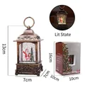 Lanterne de Noël vintage en bronze avec figurine de Père Noël et boîte cadeau - Père Noël
