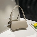 Minimalist beige underarm baguette bag with knotted straps and pebble leather texture - Khaki