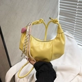 Yellow pleated crescent bag with fashion logo and a pink heart pendant charm - Yellow with Pink Heart Pendant