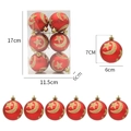 Red Christmas ball set with gold moon and star patterns in clear packaging - Moon & Star Pattern