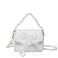 White underarm bag with elegant pearl handle and large mesh bow with sequins - White
