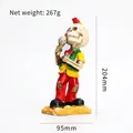 Rockstar skeleton figurine with red mohawk and gold microphone, 204mm resin decor - Multicolor Microphone