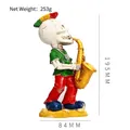 Skeleton saxophone player figurine with punk mohawk and peace sign, 195mm height - Multicolor Saxophone