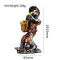 Skeleton saxophonist figurine with red outfit and golden saxophone 193mm height decoration - Saxophone Style