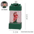 Christmas gift box snow globe with green bow and Santa Claus figure, height 12cm - Green Santa / Green