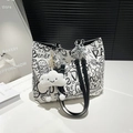 White graffiti tote bag with black print, silver chain straps, and cloud plush charm - With Pendant / White