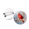 Round brooch featuring a Northern Cardinal bird glass dome and silver metal pin base - Cardinal on Snow Branch (JY007876-1)