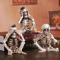 Three skeleton figurines in Hear-See-Speak No Evil poses for Halloween party decor - Hear No See No Speak No Models