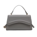Elegant dark grey minimalist faux leather handbag with curved envelope flap and gold hardware - Gray