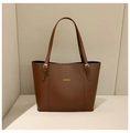 Brown leather tote bag with gold lettering and adjustable straps for daily fashion - Brown