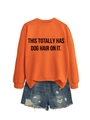 Flat lay of an orange crewneck sweatshirt and distressed blue denim shorts combo - Orange (Black Font)