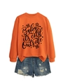 Detail of orange sweatshirt with Baby it's cold outside print and frayed denim shorts - Orange (Black Font)