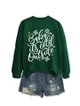 Flat lay of green sweatshirt with snowflake print and distressed denim shorts set - Dark Green (White Font)
