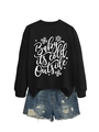 Close-up of Baby it's cold outside slogan and snowflake print on black sweatshirt - Black (White Font)
