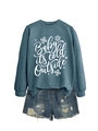 Detail of Baby It's Cold Outside sweatshirt with snowflake print and distressed denim shorts - Blue (White Font)