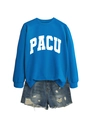 Detail of blue crewneck sweatshirt with PACU print and distressed denim shorts ensemble - S / Lake Blue (White Font)