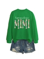 Detail of green crewneck sweatshirt with happiness is being mimi floral text and denim shorts - S / Grass Green (White Graphics)