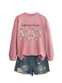 Detail of pink sweatshirt with floral MIMI print paired with distressed denim shorts - Rose Gold (Black Text)