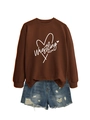 Flat lay of brown Wrestling Mom heart sweatshirt paired with distressed denim shorts - Coffee (White Font)