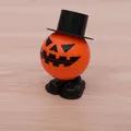 Wind-up pumpkin toy with black hat and shoes for Halloween gift, vibrant orange finish - Pumpkin with Black Hat