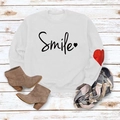 Detail of white cotton sweatshirt with smile text and red heart print on the sleeve - White (Black Font)