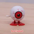 Wind-up walking red eyeball toy for Halloween with realistic red bloodshot veins - Red Eyeball
