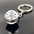 Macro shot of silver keychain with glass pendant featuring Je T'aime Mon Papa D'amour text - JE T'AIME MON PAPA Style (XSWX2255-4)