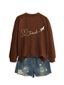 Close-up of brown oversized sweatshirt featuring a Travel print and side slit detail - S / Coffee (White Font)