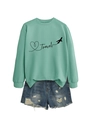 Flat lay of a mint green Travel sweatshirt with distressed denim shorts set - S / Light Green (Black Font)