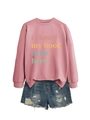 Detail of pink sweatshirt with i closed my book to be here text and distressed denim shorts - Rose Gold