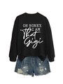 Detail of black sweatshirt with Oh Honey I Am That Gigi text and distressed denim shorts - Black (White Font)
