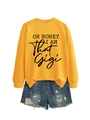 Detail view of ginger yellow sweatshirt with OH HONEY I AM THAT GIGI print and denim shorts - Yellow (Black Font)