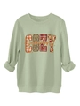 Primer plano del estampado COZY season con cuadros y leopardo en sudadera verde claro - Verde oliva