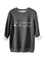 Close-up of dark grey sweatshirt featuring fleece lining and Life is better slogan - Dark Gray