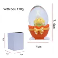 Bola de nieve de Pascua con conejo blanco en forma de huevo y caja de embalaje blanca - Naranja (Conejo)