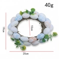 Ghirlanda pasquale in rattan con uova colorate maculate e piccoli fiori gialli - Stile Bianco (Stile B Bianco)