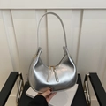 Silver crescent moon shoulder bag in metallic finish with double zipper and gold hardware - Silver