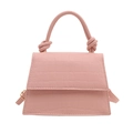 Borsa a mano rosa con trama a coccodrillo, manico annodato e tracolla da donna - Rosa