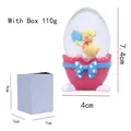 Easter glass egg figurine with yellow chick on pink base with blue polka dot bow - Yellow Chick - Pink Base Blue Bow