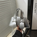 Silver metallic trapezoid handbag with eyelet straps and adjustable shoulder strap - Silver