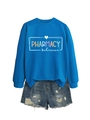 Flat lay of royal blue pharmacy technician sweatshirt paired with distressed denim shorts - S / Lake Blue (White Print)