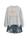 Flat lay of gray art teacher sweatshirt paired with distressed denim shorts - Gray