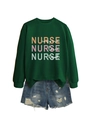 Detail of dark green nurse sweatshirt with inspire love heal print and denim shorts - Dark Green
